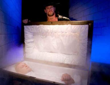 The Undertaker with the lifeless mummy of Heidenreich